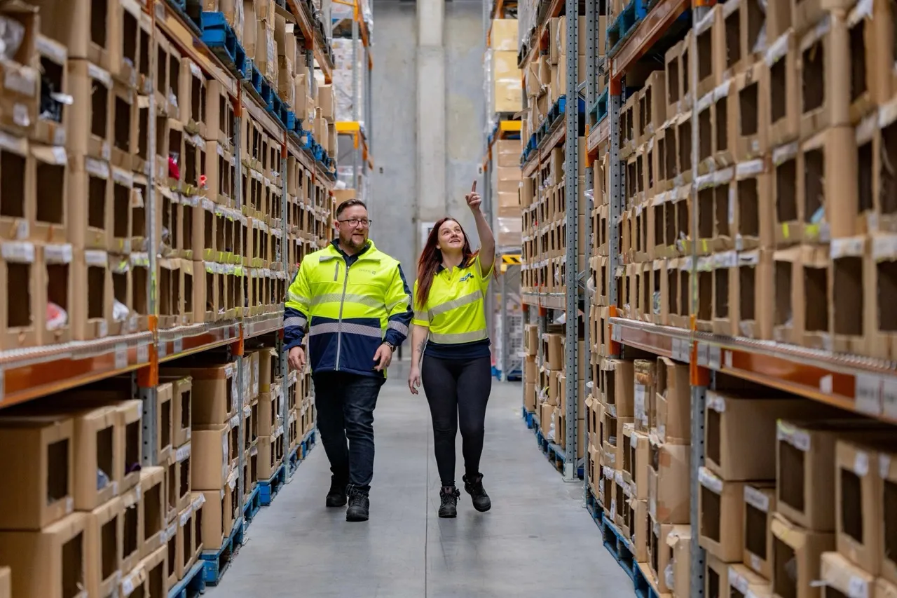 Operations team checking stock and presentation standards in the warehouse
